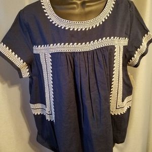 Falls Creek Navy blue top with white embroidery.